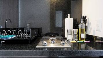 Fridge, microwave, stovetop, coffee/tea maker