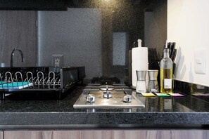 Fridge, microwave, stovetop, coffee/tea maker