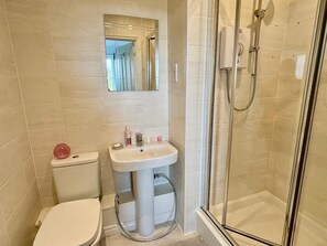 Shower, towels, soap, shampoo