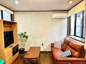 Deluxe House, 3 Bedrooms | Living area | 55-inch flat-screen TV with digital channels, Netflix, Hulu - SUMITSUGU HOUSE Station (Kumamoto)
