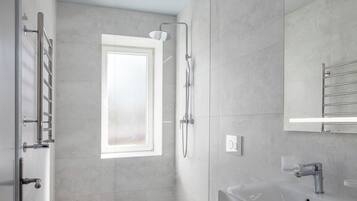 Quadruple Room | Bathroom | Shower, hair dryer, towels, soap