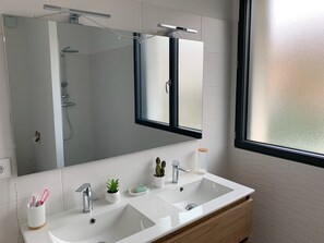 Shower, hair dryer, towels, soap