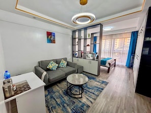 Deluxe Studio, 1 Queen Bed, City View | Living area | 43-inch Smart TV with digital channels, Netflix, streaming services - Takdiri Homes Executive Studio (Nairobi)