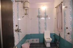 Basic Double Room, City View | Bathroom | Shower, free toiletries, towels, soap - sk kathiyawadi hotel & restaurant (Udaipur)