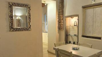 Superior Apartment, Courtyard View | Living area | Flat-screen TV