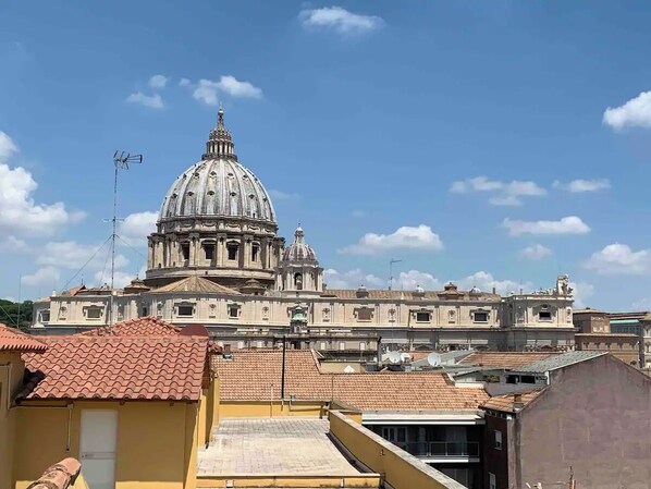 A large historic building with a prominent dome and classical architecture.