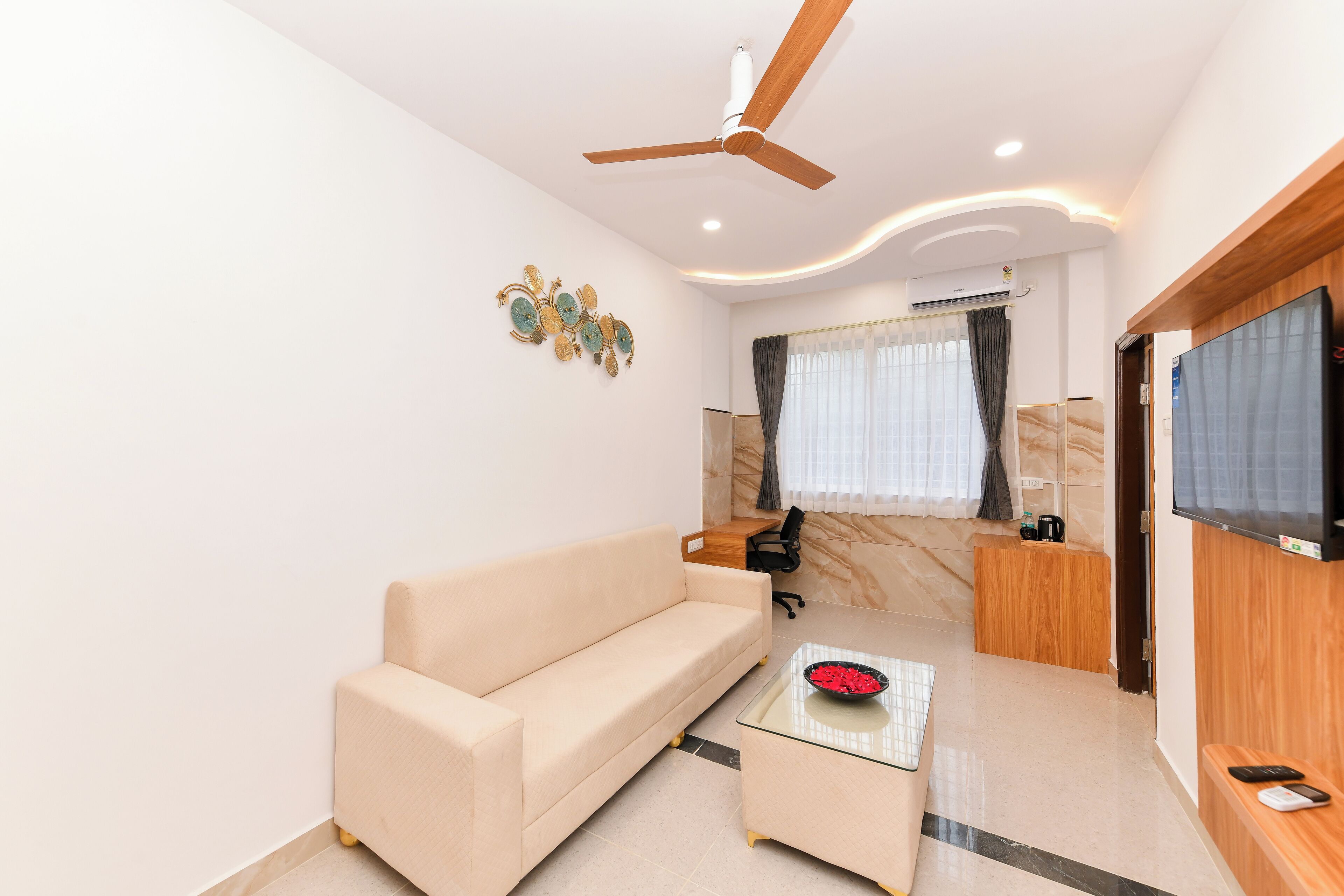 Luxury Suite | Living area | TV, fireplace, printers