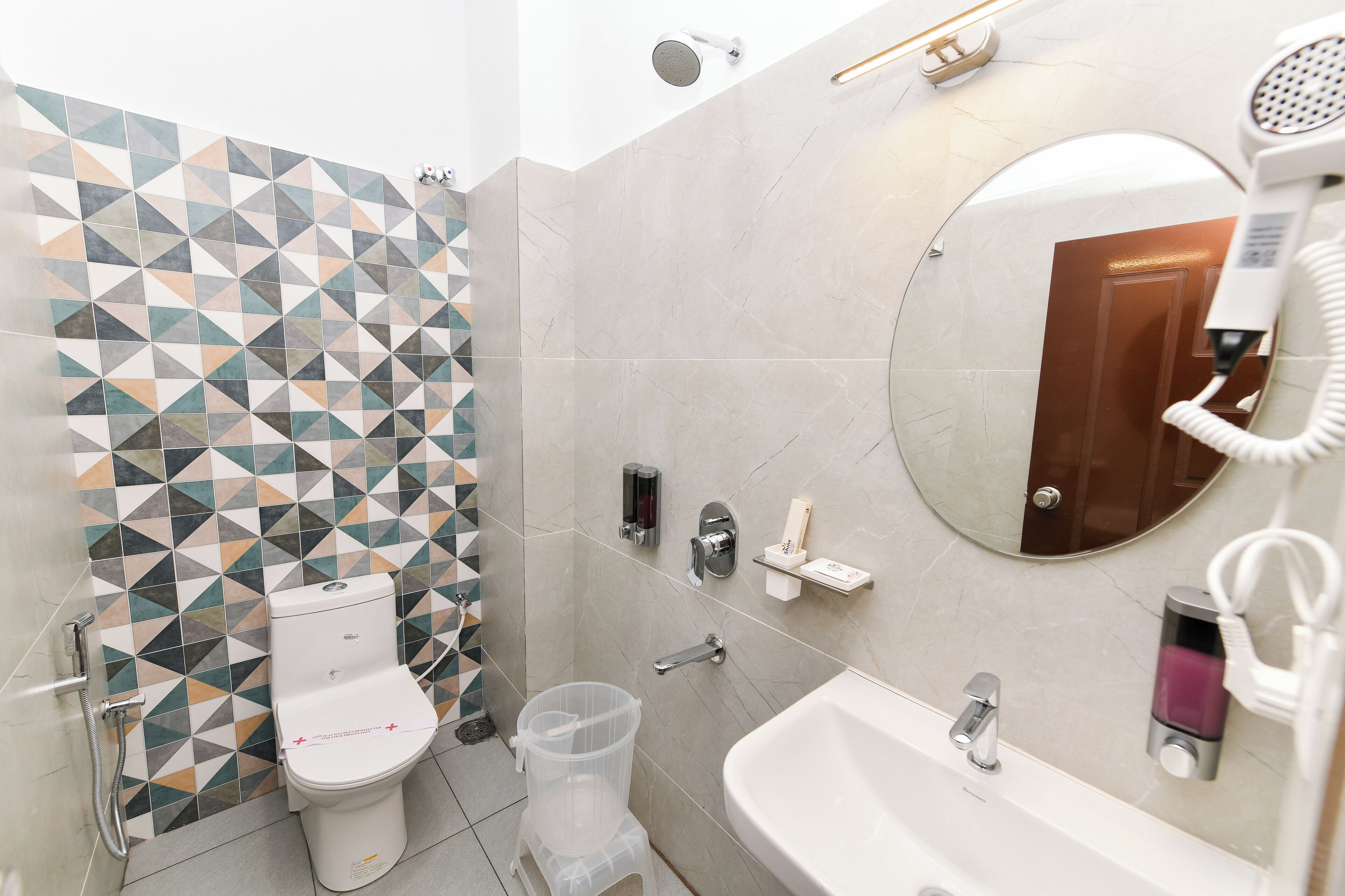 Designer toiletries, towels, soap, shampoo