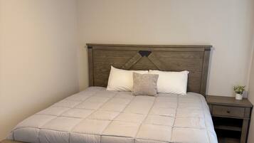 Family Townhome, 2 Bedrooms, Kitchen, Garden View | 2 bedrooms, free WiFi, bed sheets