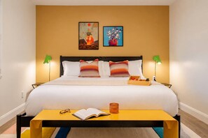 Settle into this welcoming bedroom with warm lighting, colorful accents, and a comfortable place to unwind. - Resort Backyard with Sauna, Pool, Hot Tub & Sports (Plantation)