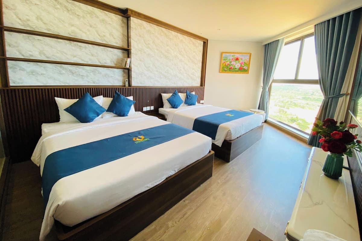 Chambre Deluxe avec lits jumeaux, vue partielle sur l'océan