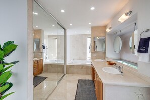 Jetted tub, hair dryer, towels, soap