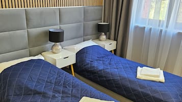Deluxe Apartment, City View | 2 bedrooms, in-room safe, desk, laptop workspace