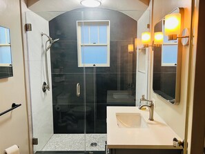 Shower, hair dryer, towels, soap
