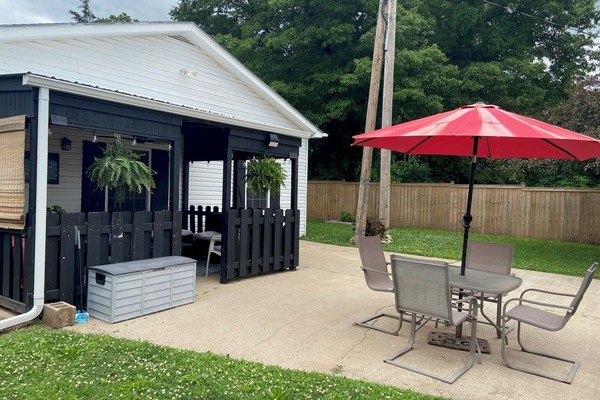 Our covered patio has a ceiling fan & plenty of bench cushions (in the tote).