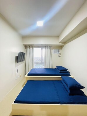 Iron/ironing board, bed sheets - Stylish Studio at Avida Towers Atria with Access to Pool (Iloilo City)