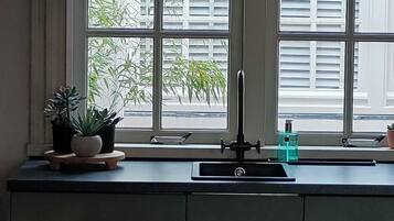 Apartment, Harbor View | Private kitchen | Coffee/tea maker, electric kettle, highchair