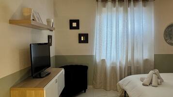 1 chambre, fer et planche Ă repasser, Wi-Fi, draps fournis