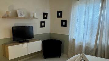 1 Schlafzimmer, BĂŒgeleisen/BĂŒgelbrett, WLAN, BettwĂ€sche