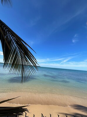 On the beach, sun-loungers, beach towels