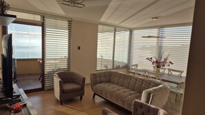 Living area - Modern Lakefront Apartment with Stunning Terrace Views in Villarica (Villarica)