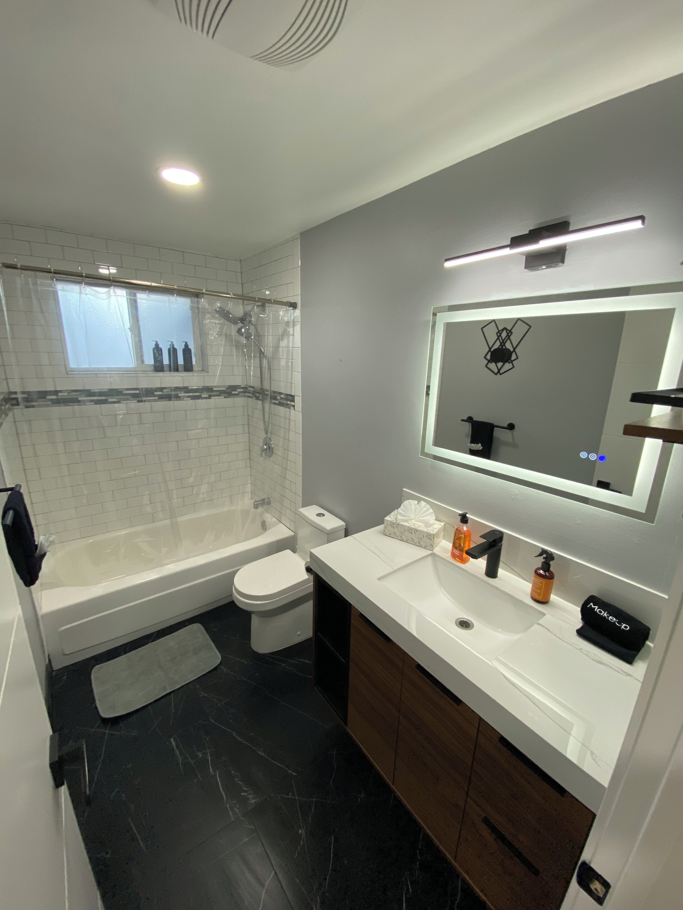 Hair dryer, towels, soap, shampoo