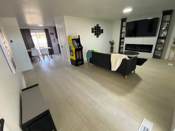 Smart TV, fireplace, books