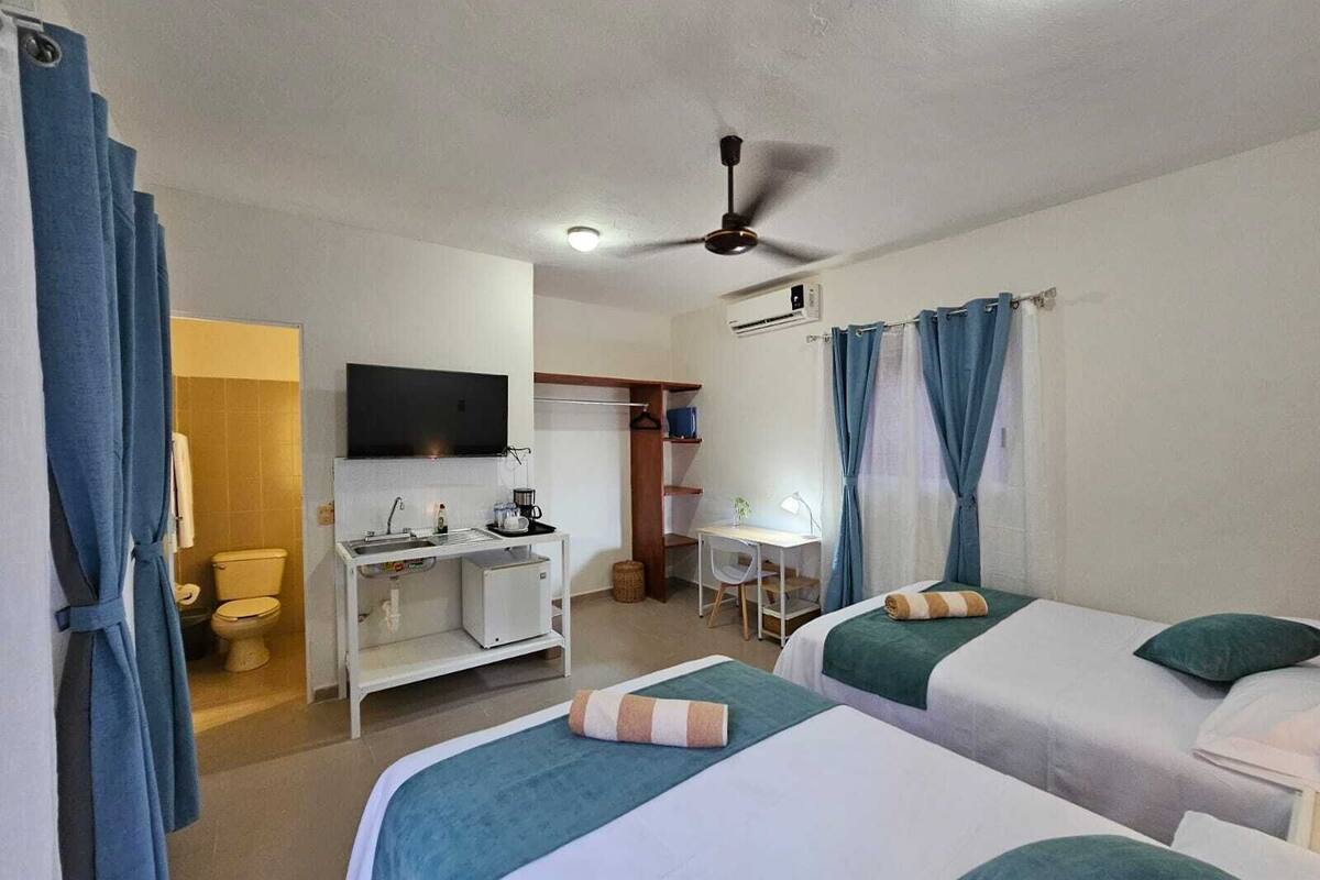 Desk, laptop workspace, blackout curtains, free WiFi