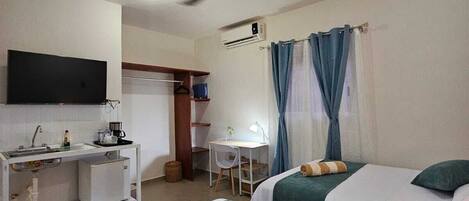 Desk, laptop workspace, blackout drapes, free WiFi