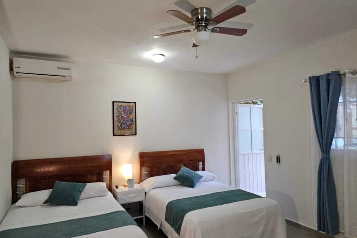Desk, laptop workspace, blackout curtains, free WiFi
