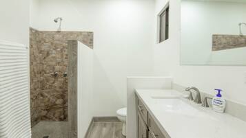 Shower, towels, toilet paper