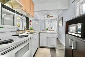 Fridge, oven, stovetop, coffee/tea maker