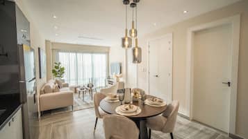 One Bedroom Standard | Living area | 40-inch Smart TV with satellite channels, Netflix, streaming services