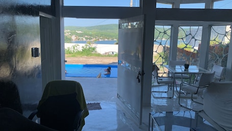 Pool. Single house in front of the lake