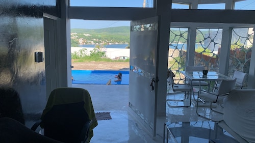 Single house in front of the lake