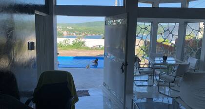 Single house in front of the lake