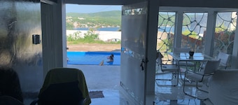 Single house in front of the lake