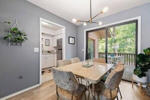Enjoy meals in this stylish dining area with a large table and comfortable seating for six.