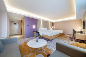 Family Studio Suite | Living area | LCD TV, pay films