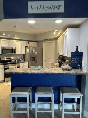 Private kitchen - Ocean View beauty in Ocean Walk, steps to private, no drive beach  (New Smyrna Beach)