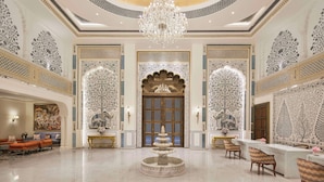 A luxurious lobby with a grand chandelier, ornate wall decorations, and a central fountain. - Anantara Jewel Bagh Jaipur (Jaipur)