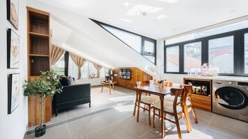 Classic Loft | Living area | Flat-screen TV