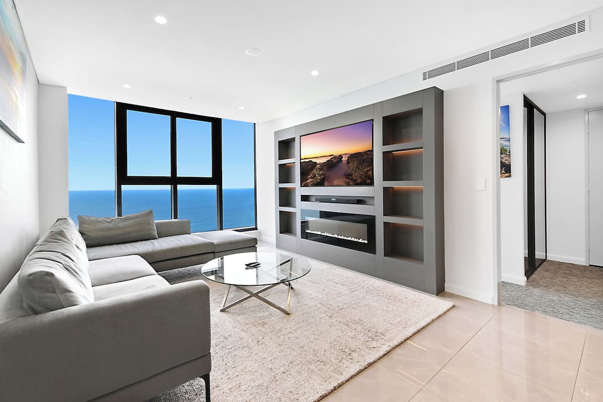 Departamento, 2 habitaciones, para no fumadores, vista al océano | Área de sala de estar | Televisión