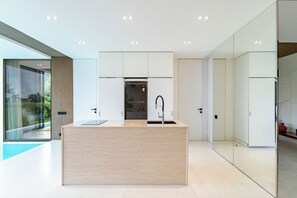 Deluxe Villa | Private kitchen | Coffee/tea maker, electric kettle, highchair