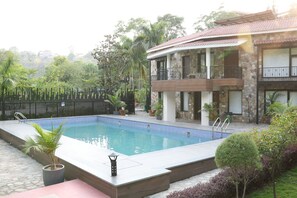 Outdoor pool - Pleasant Tree Hotels  (Dehradun)