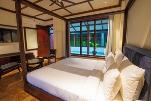 Luxury Studio Suite, Pool View | In-room safe, desk, iron/ironing board, free WiFi