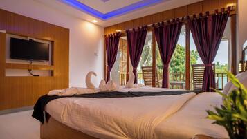 Kamar Double Deluks, balkon, pemandangan kebun | Ruang kerja ramah laptop, Wi-Fi gratis, dan seprai linen