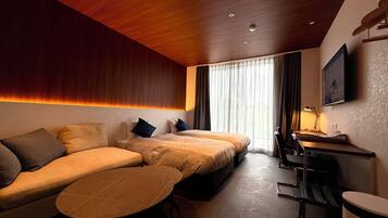 Cubrecamas, escritorio, espacio para trabajar con laptop y wifi gratis