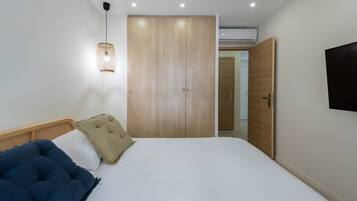 2 slaapkamers, een strijkplank/strijkijzer, reisbedje, gratis wifi