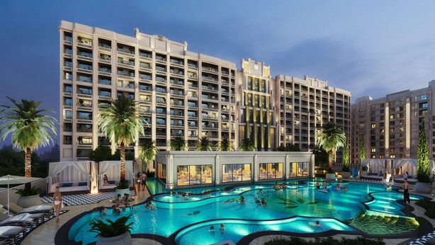 A hotel with multiple floors, a swimming pool area with various pool shapes, and palm trees. - OZEN MANSION KOLKATA (Barasat)
